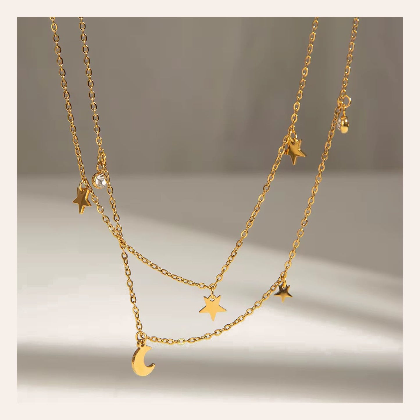 Collar Nigth Gold doble cadena con estrellas y luna