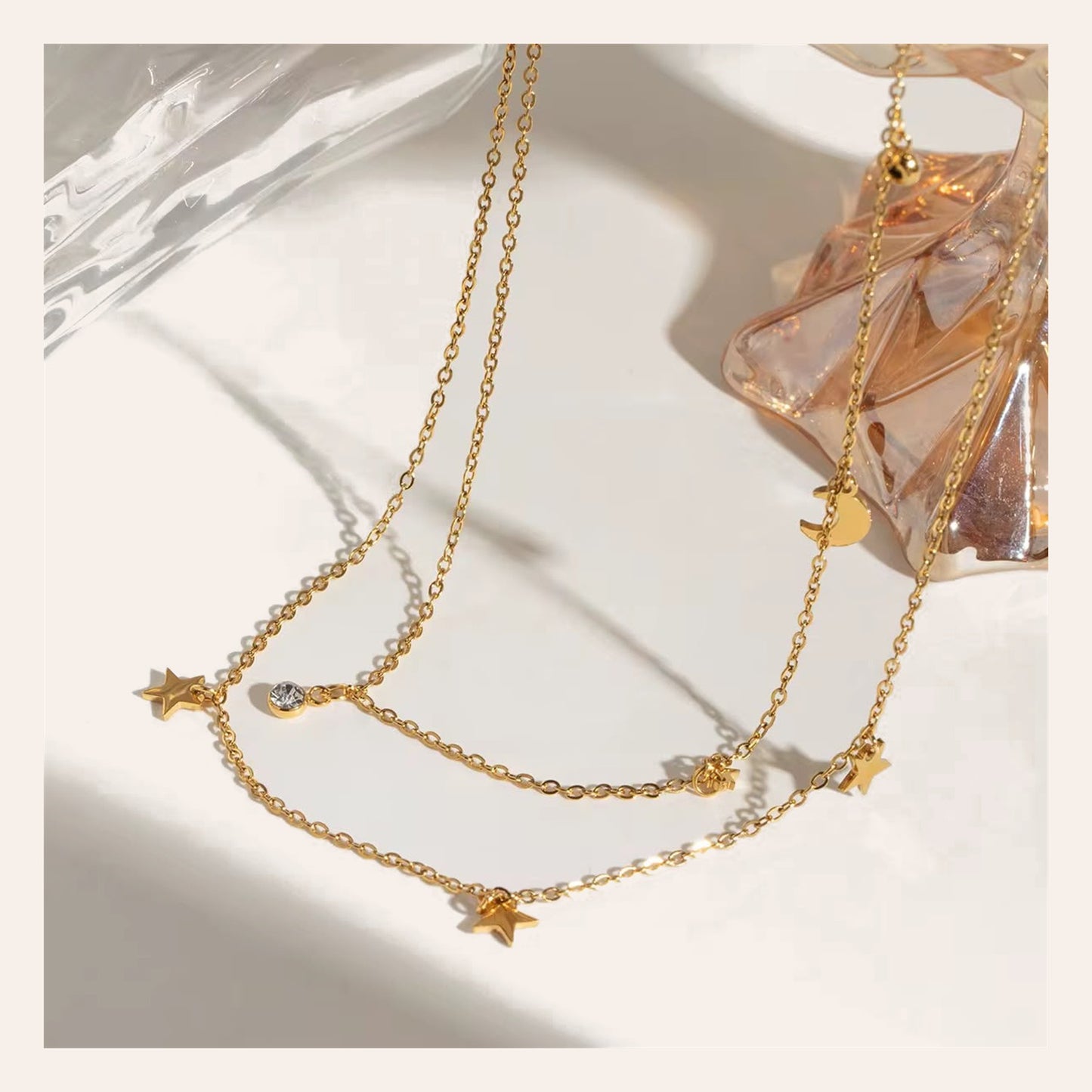 Collar Nigth Gold doble cadena con estrellas y luna