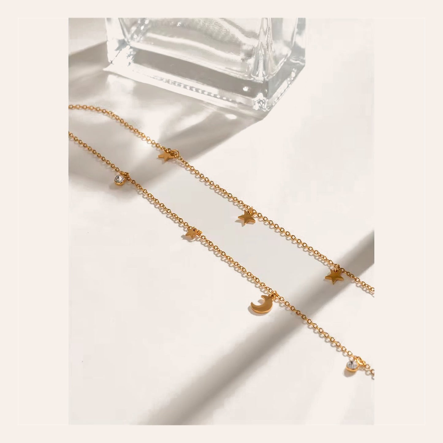 Collar Nigth Gold doble cadena con estrellas y luna