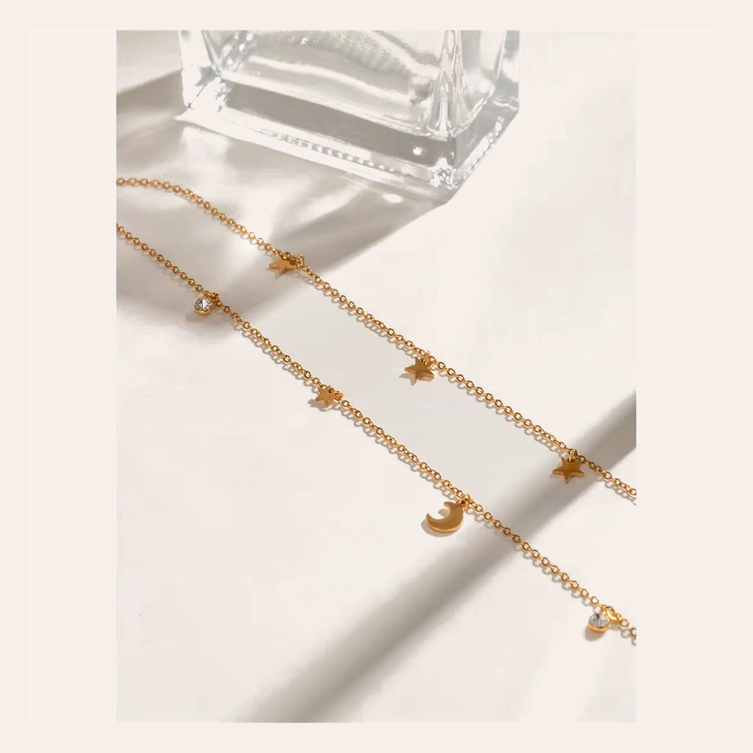 Collar Nigth Gold doble cadena con estrellas y luna