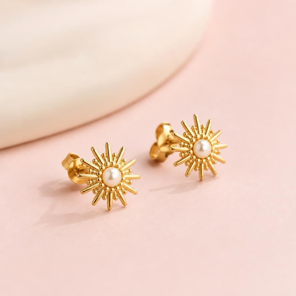 Aretes Sol con perla dorados